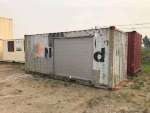 20' used container w/ 8' roll shutter door installed in sidewall